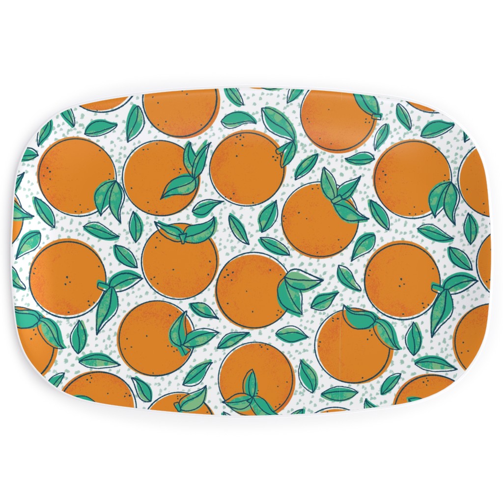 oranges-with-leaves-on-white-serving-platter-shutterfly