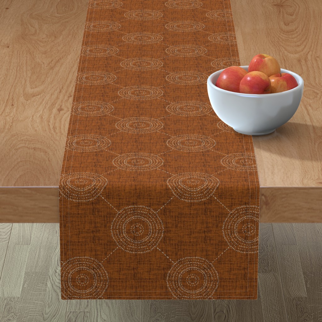 radiating happiness in rust table runner